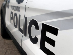 An SUV drove on a sidewalk, nearly hitting pedestrians, after a road-rage incident near the CN Tower, according to Toronto Police.
