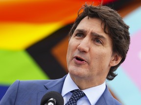 Prime Minister Justin Trudeau takes part in a Pride flag raising event