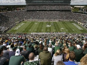 Michigan State and Air Force play an NCAA college football game, Saturday, Sept. 19, 2015, in Spartan Stadium in East Lansing, Mich. Gov. Gretchen Whitmer signed legislation Tuesday, July 18, 2023, allowing liquor licenses to be issued to sporting venues at public universities, including Michigan State in East Lansing and the University of Michigan in Ann Arbor.