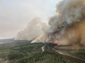 A large wildfire burns this handout image provided by the Government of Alberta and posted on their social media page.
