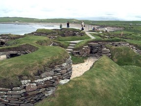Visitors at the 5,000 year-old remains of Skara Brae village in the Scottish Orkney Islands, July 19, 2005, which was revealed by a huge storm in 1850. Sick of being ignored by far-away politicians, officials on Scotland's remote Orkney Islands are mulling a drastic solution. They want to rejoin Norway, the Scandinavian country that gave them away as a royal wedding dowry more than 550 years ago. Orkney Islands Council is due to debate options for "alternative models of governance" on Tuesday, July 4, 2023.