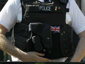 A police officer keeps watch in Westminster