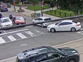 Toronto Police released video of a driver in a stolen vehicle that injured an officer on July 22.