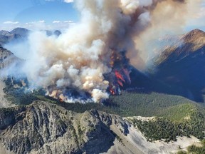 An undated handout photo provided by the British Columbia Wildfire Service on July 9, 2023, shows an aerial view of the Texas Creek wildfire, located approximately 27 km south of Lillooet, B.C.