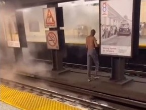 A viral video -- tweeted by 6ixbuzz tv -- shows a shirtless man spraying a fire extinguisher at Christie subway station.