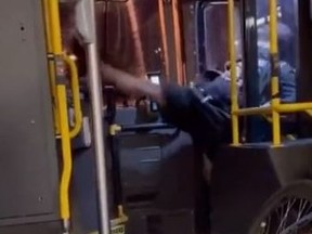 A passenger is seen kicking in the direction of a TTC driver in this video screenbrab.