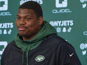 FILE - New York Jets' Quinnen Williams speaks to reporters after a practice at the NFL football team's training facility in Florham Park, N.J., May 24, 2022. Williams and the Jets have agreed, Thursday, July 13, 2023, to a four-year contract extension worth $96 million, according to a person with knowledge of the deal.