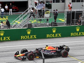 Red Bull's Max Verstappen crosses the finish line