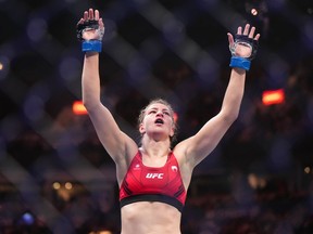Jasmine Jasudavicius celebrates after her fight against Miranda Maverick during a UFC 289 women's flyweight bout, in Vancouver, on Saturday, June 10, 2023.&ampnbsp;Jasudavicius will face American Tracy Cortez on a UFC Fight Night card in September in Las Vegas.