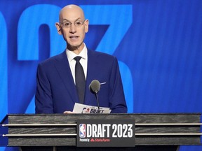 NBA Commissioner Adam Silver announces the 13th pick in the NBA draft, June 22, 2023, in New York City.