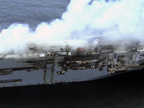 Smoke is seen from a freight ship in the North Sea