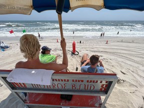 Lifeguards watch bathers on Long Beach