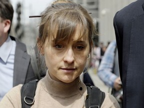 Allison Mack leaves federal court in the Brooklyn borough of New York, April 8, 2019