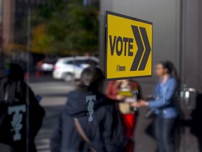 Advance voting is set to start today in provincial byelections in Kanata-Carleton and Scarborough-Guildwood. Voters line up outside a voting station to cast their ballot in a municipal election in Toronto on Monday, October 22, 2018.