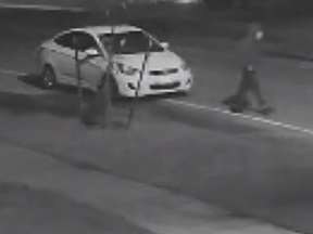 An image released by Peel Regional Police of a suspect and a 2012-17 model white Hyundai Accent Sedan believed involved in the fatal carjacking of food delivery driver Gurvinder Nath in Mississauga.