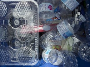 Plastics are seen being gathered for recycling