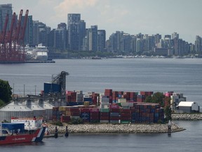 Stacks of cargo containers are seen at port during a strike by International Longshore and Warehouse Union Canada workers