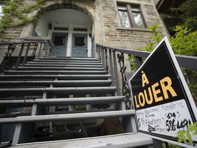 Real estate signage showing an apartment for rent is seen on Monday, May 15, 2023 in Montreal