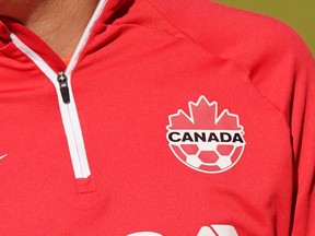 A detail view of Canada branding on the team uniform during a training session ahead of the FIFA Women's World Cup in Melbourne, Australia, Monday, July 17, 2023. The Canadian men's soccer team has fired another salvo in its ongoing labour battle with Canada Soccer, accusing the governing body of "attempting to capitalize on the Women's World Cup to force us into an inadequate deal."