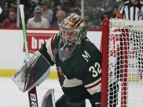 FILE - Minnesota Wild goaltender Filip Gustavsson (32) defends the net against against the Dallas Stars during the second period of Game 4 of an NHL hockey Stanley Cup first-round playoff series Sunday, April 23, 2023, in St. Paul, Minn. The Minnesota Wild signed goalie Filip Gustavsson to a three-year, $11.25 million contract on Monday, July 31, 2023, avoiding salary arbitration after his strong first season with the club.