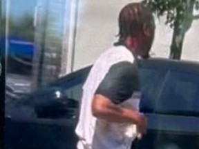 One of three men wanted by police.