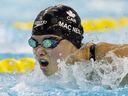 Marggie Mac Neil swims her way to winning the women's 100-metre butterfly at the Canadian swimming trials in Toronto on Wednesday, March 29, 2023.
