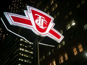 A Toronto Transit Commission sign is shown at a downtown Toronto subway stop, Tuesday, Jan. 24, 2023.