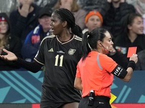 Jamaica's Khadija Shaw reacts after getting a red card from referee Maria Carvajal during the Women's World Cup Group F soccer match