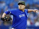 Hyun Jin Ryu of the Toronto Blue Jays delivers a pitch during a game last year.