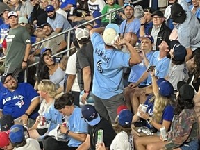 A Blue Jays fan was ejected from the stadium for throwing hot dogs on Tuesday.