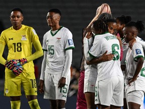Zambia players look dejected after a loss to Spain at the Women's World Cup.