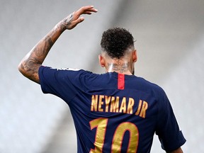 Paris Saint-Germain's Brazilian forward Neymar reacts during a match.