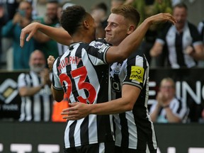 Newcastle United's Harvey Barnes (right) celebrates with Jacob Murphy after scoring their fifth goal against Aston Villa.