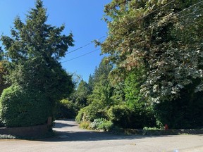 Entrance to private lane in West Vancouver's Cedardale neighbourhood where fatal crash took place at a wedding reception on Aug. 20, 2022, killing two and injuring several more.