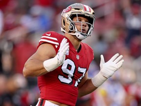 Defensive end Nick Bosa of the San Francisco 49ers celebrates a sack.