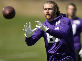 Minnesota Vikings tight end T.J. Hockenson takes part in drills during practice.