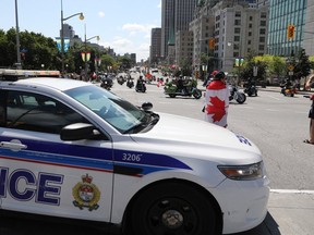 Motorcycles were turned around at Slater and Elgin in Ottawa, Saturday