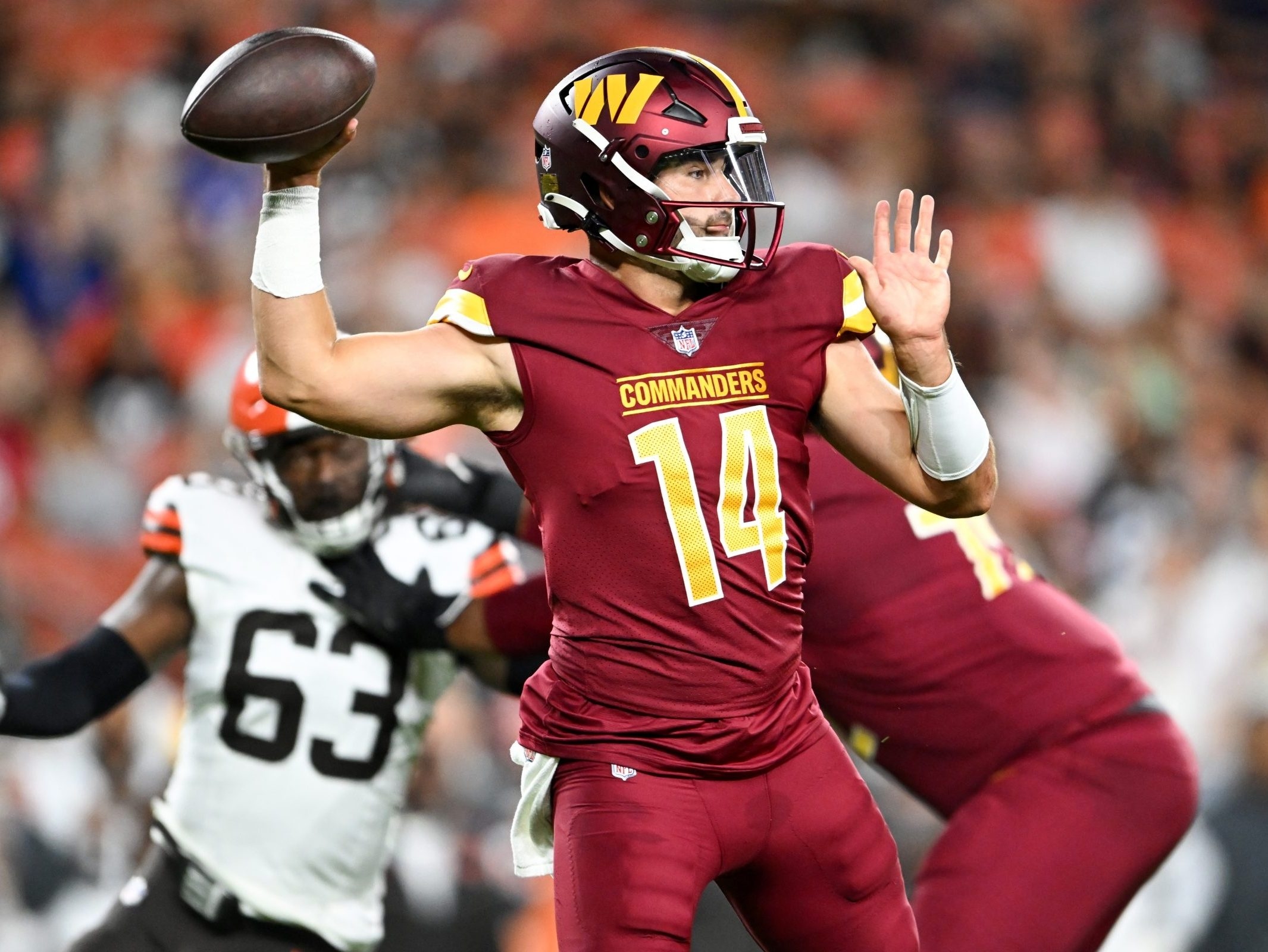 Sam Howell of the Washington Commanders attempts a pass against the News  Photo - Getty Images