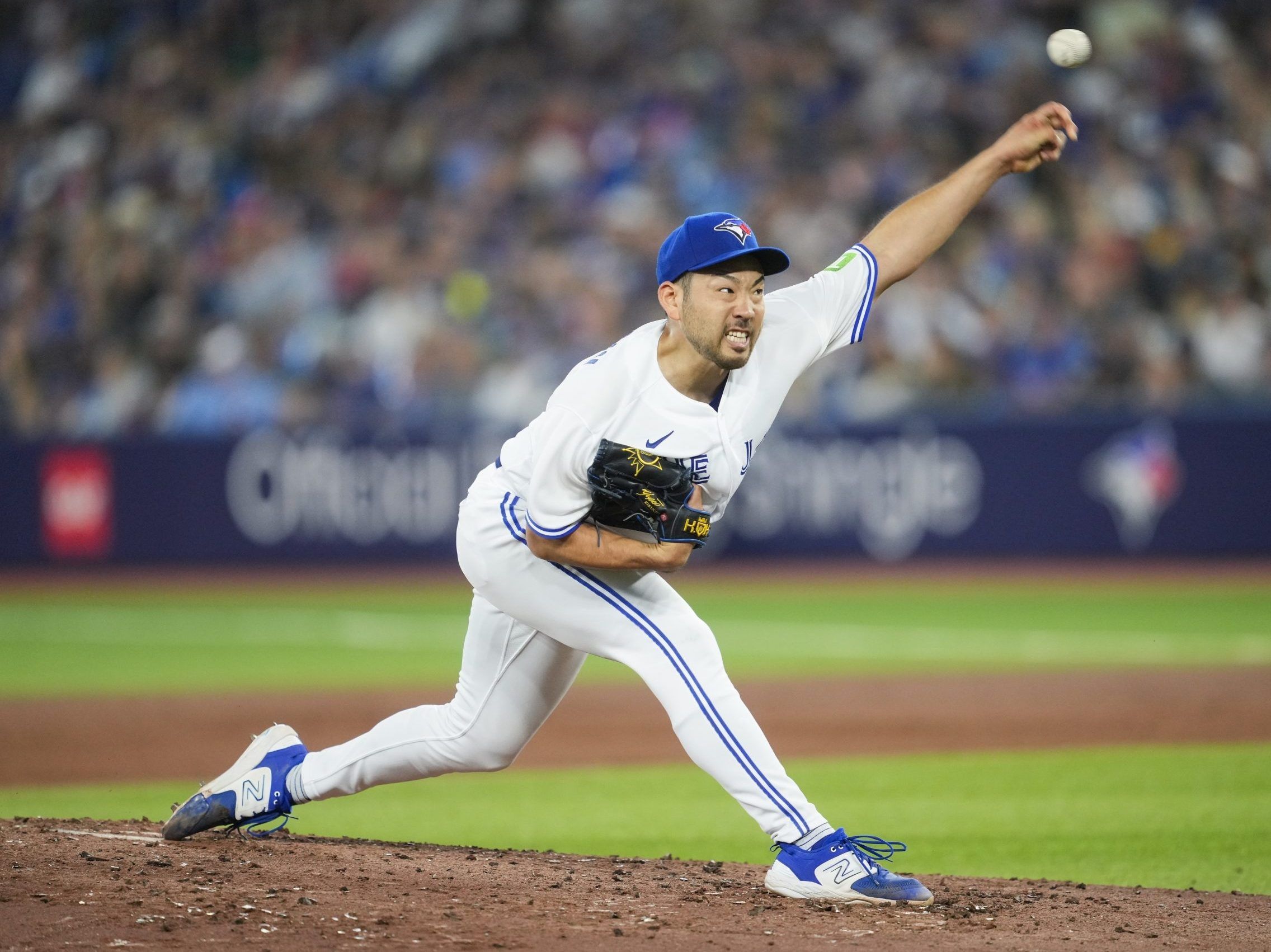 Toronto Blue Jays relief pitcher Jordan Hicks pumps his fist after