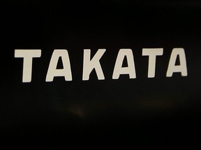 The logo of Takata Corp. is displayed at an auto supply shop in Tokyo, July 6, 2016.