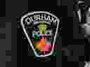 A Durham Regional Police officer's logo emblem.