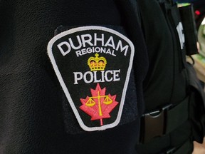 A Durham Regional Police officer's logo emblem.