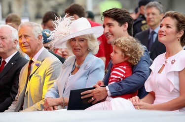 Prince Charles, Prince of Wales, Camilla, Duchess of Cornwall, Justin Trudeau, Hadrien Trudeau and Sophie Grégoire Trudeau watch Canada Day celebrations on Parliament Hill during a 3 day official visit to Canada on July 1, 2017 in Ottawa.