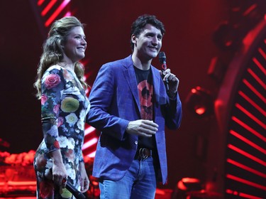 Canada's Prime Minister Justin Trudeau and his wife Sophie Gregoire speak on stage on stage during the Global Citizen Festival G20 benefit concert at the Barclaycard Arena in Hamburg, northern Germany on July 6, 2017 on the eve of the G20 summit. (RONNY HARTMANN/AFP via Getty Images)