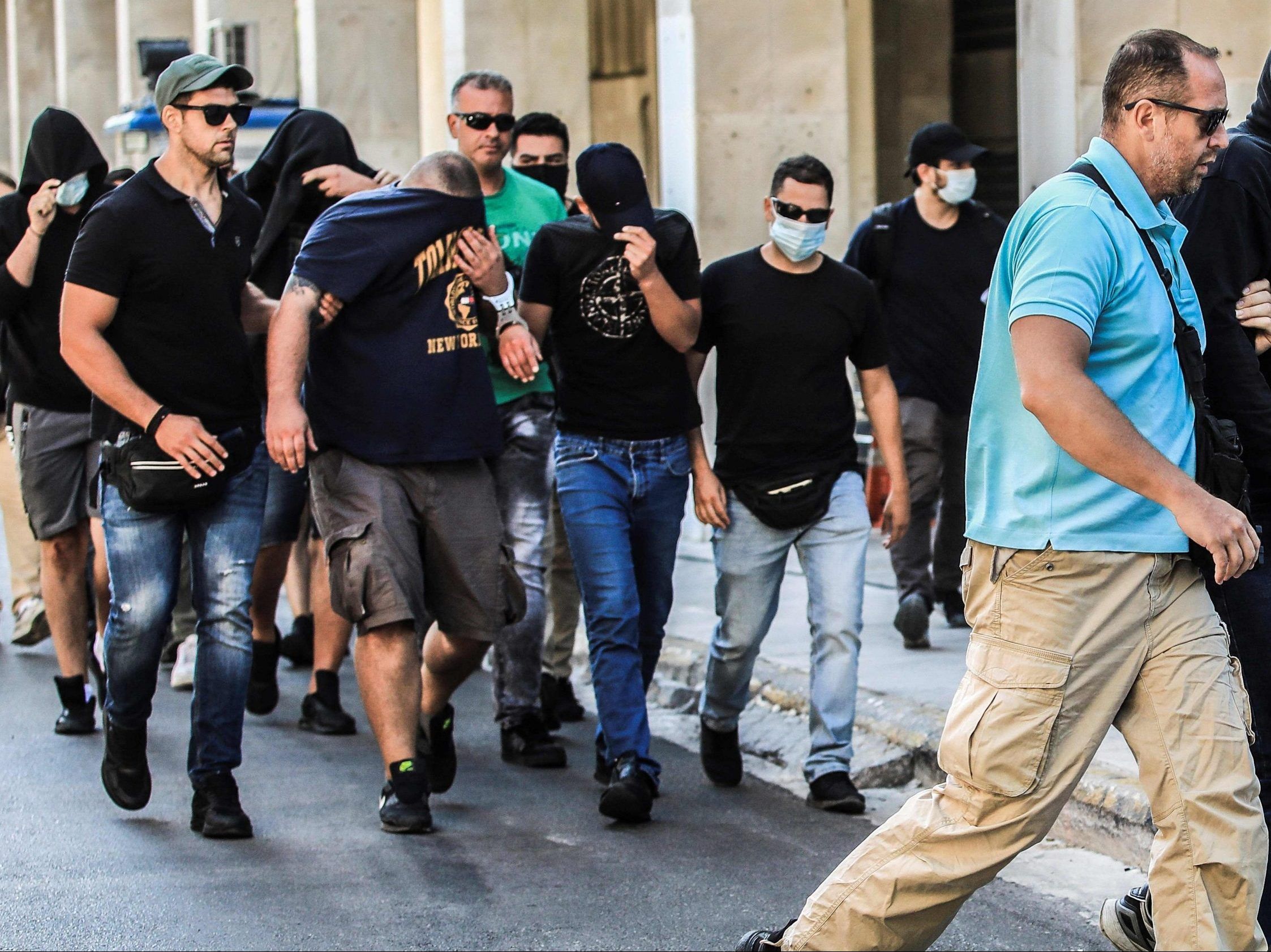 Nearly 100 soccer fans face murder, gang-related charges in Greece Toronto pic