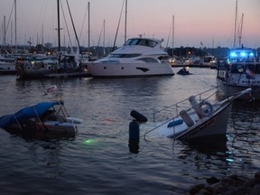 CAPTAIN COOKED: Cops say a blasted skipper sank his boat in Hamilton Harbour. HAMILTON POLICE