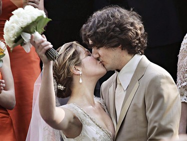 Justin Trudeau, son of the late Prime Minister Pierre Trudeau, kisses his new bride Sophie Gregoire after their marriage ceremony in Montreal Saturday, May 28, 2005. THE CANADIAN PRESS/Ryan Remiorz
