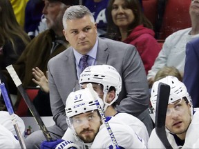 Toronto Maple Leafs coach Sheldon Keefe watches play.