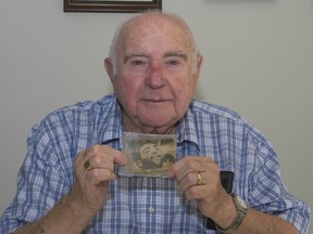 Former Springhill miner Harold Brine poses in his home