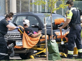 Toronto Paramedics treat a patient.